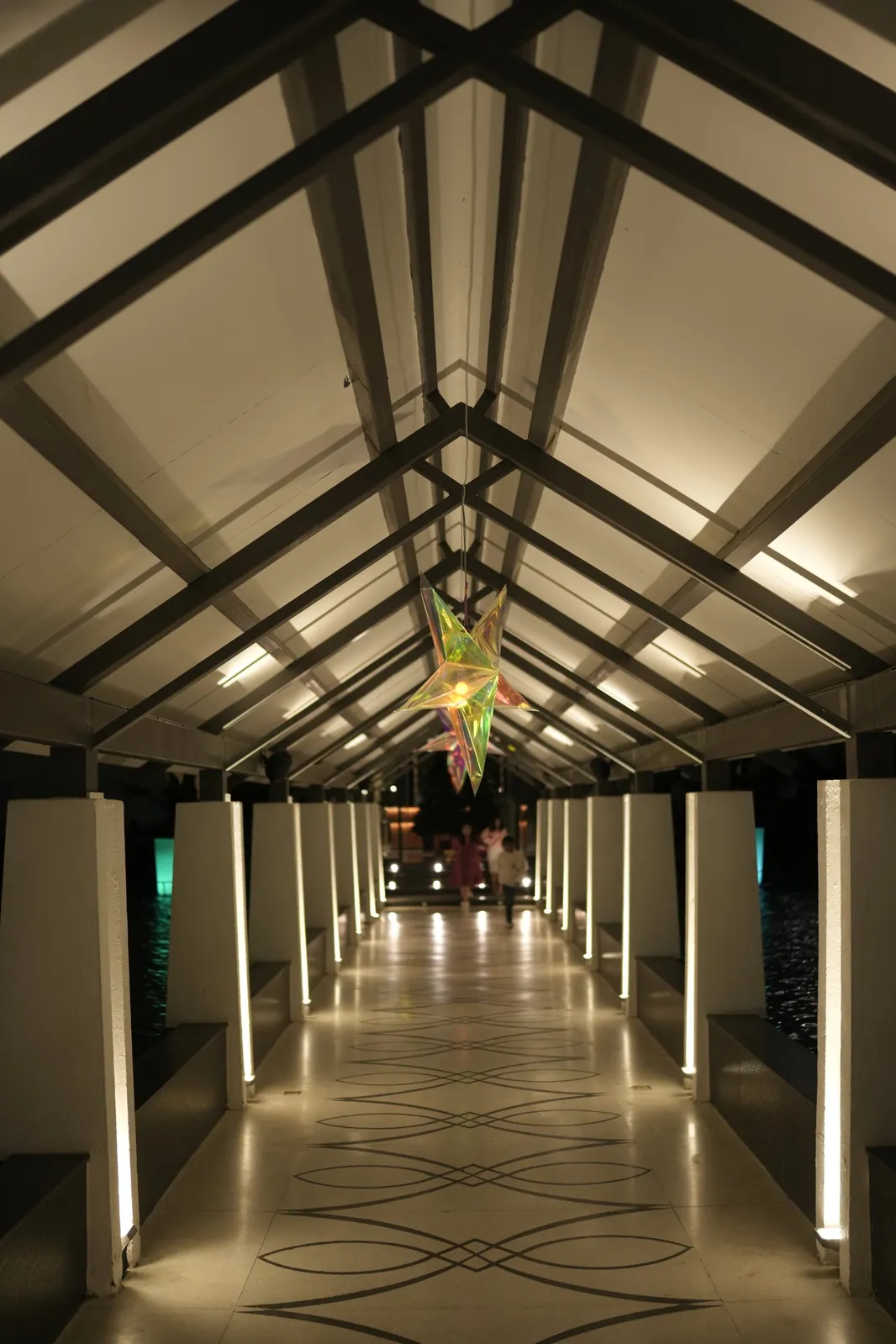 Festive walkway with star lanterns at Sportico Resorts on New Year's Eve