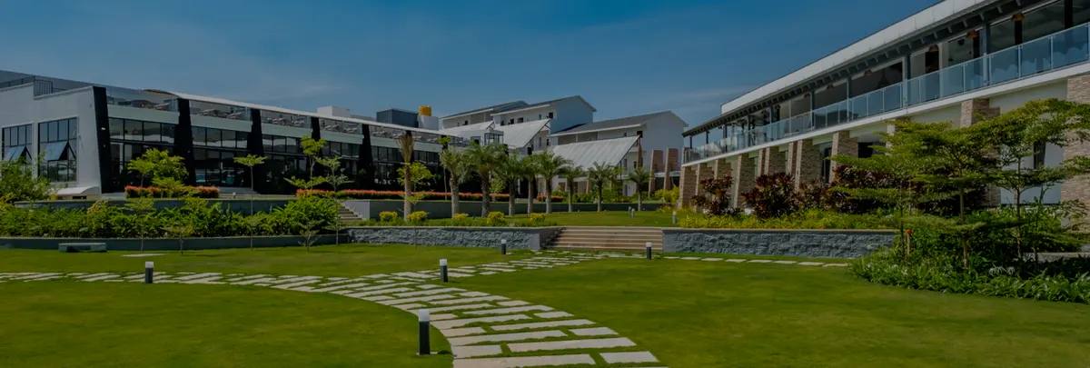 Lawn and villas at Sportico Resorts near Bangalore