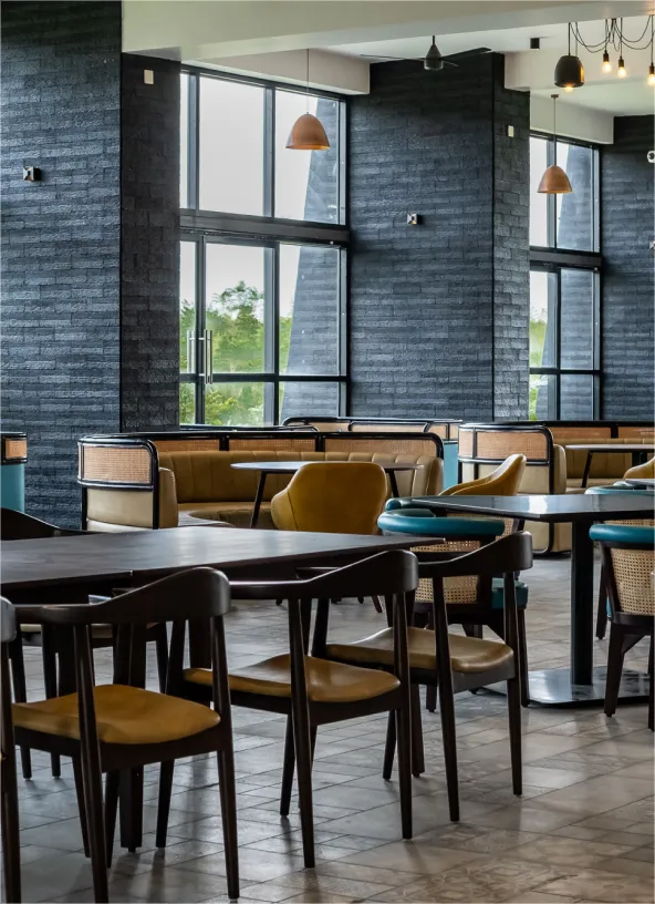 Lounge seating at Saffron Restaurant, Sportico Resorts near Bangalore