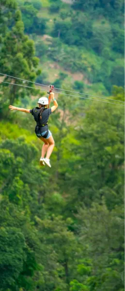 Zipline ride over the trees at Sportico Resorts near Bangalore
